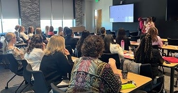 attendees listening to presentation