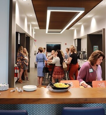 group of women chatting and enjoy breakfast