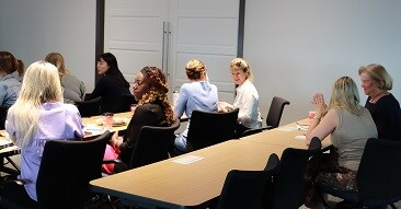 women collaborating during presentation