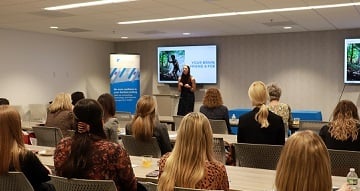 women's listening to presentation