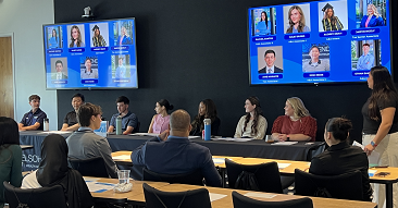 students listening to a panel