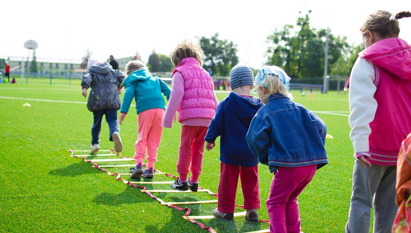 children playing hopscotch 