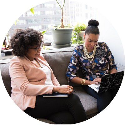 women looking at a laptop