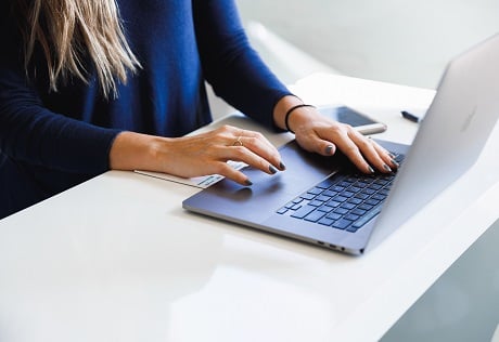 typing on laptop 