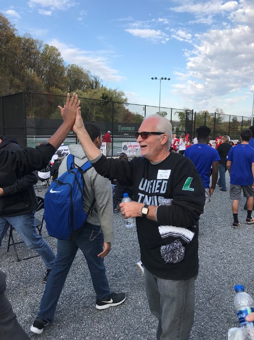 Steve Rostek volunteering at Special Olympics Maryland tennis tournament