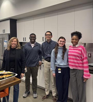 gross mendelsohn employees enjoying potluck